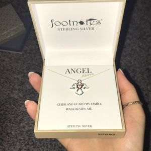Footnotes Angel above Necklace